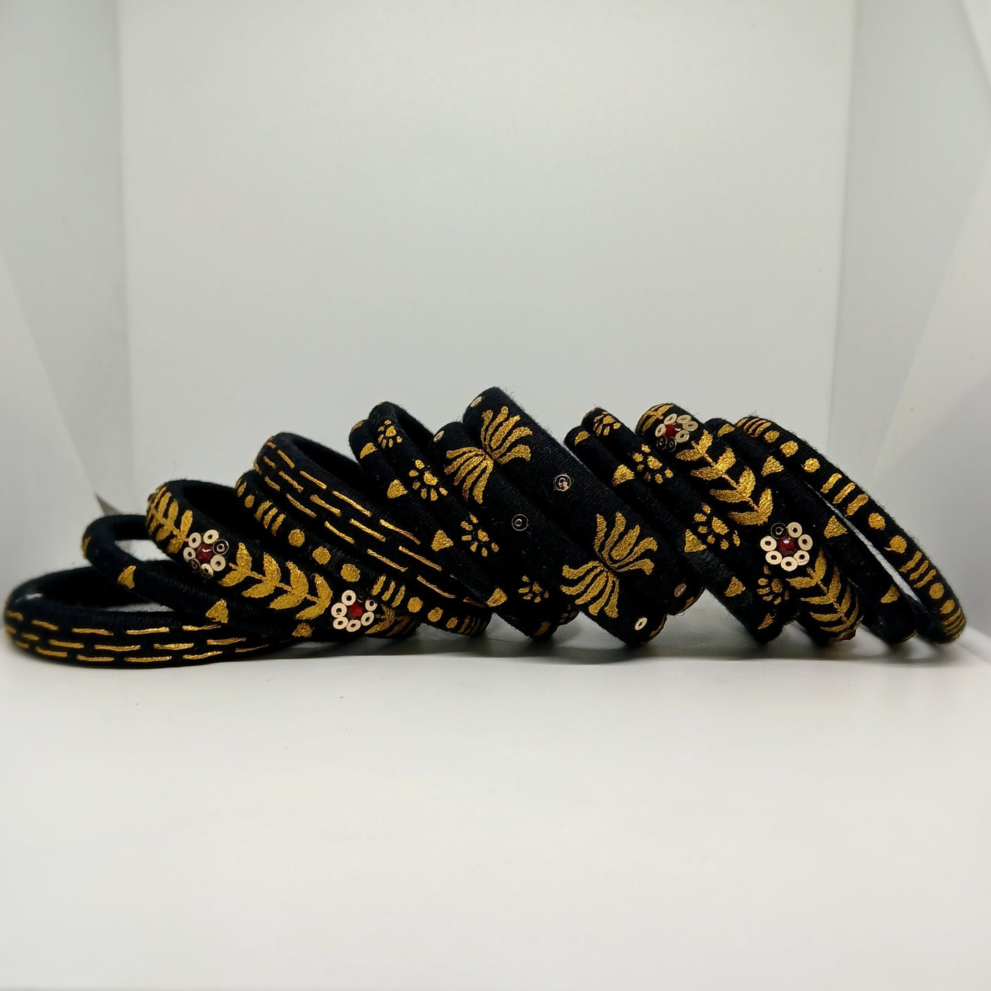 Aparna [Black and golden colour handcrafted bangles