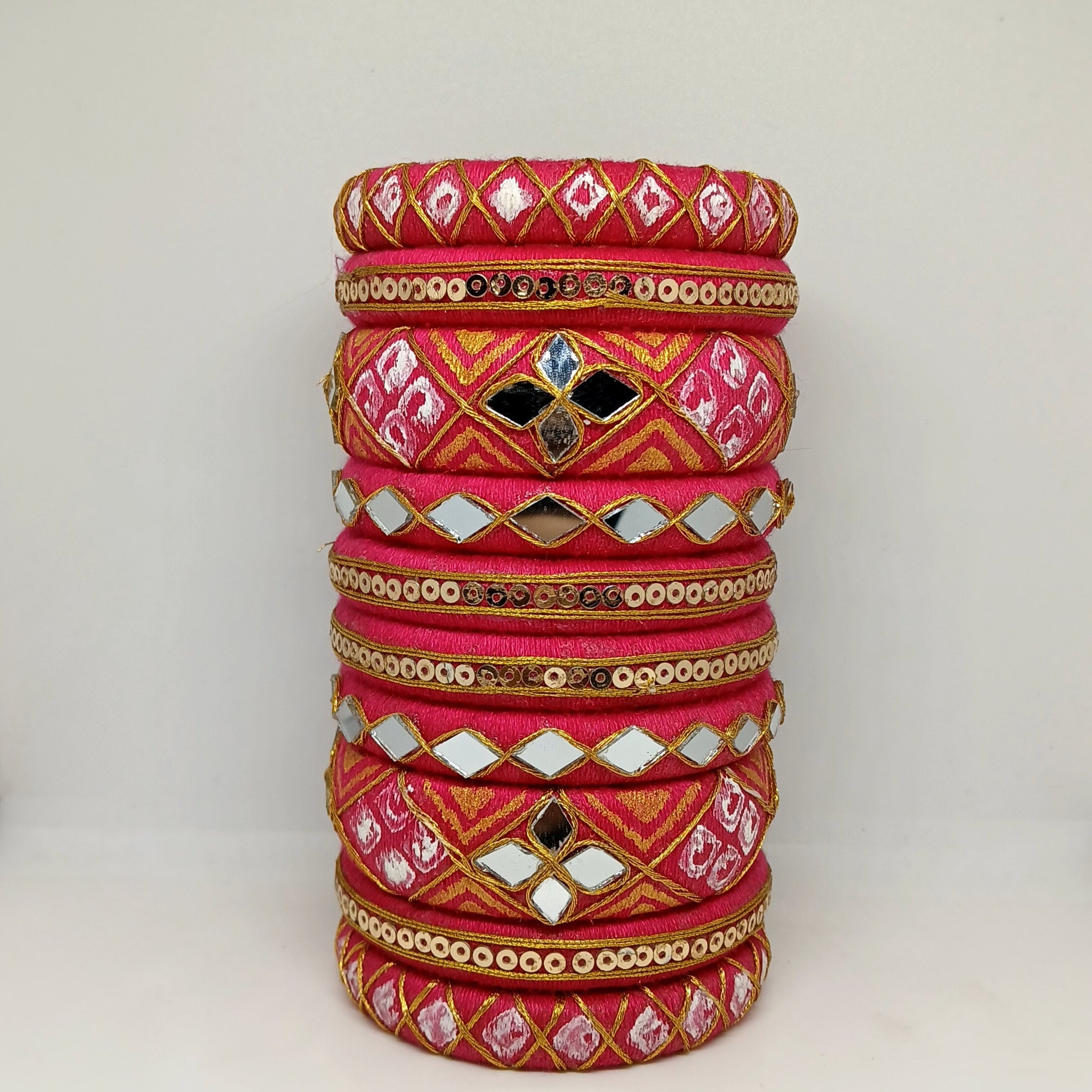 Anokhi [pink and golden colour handcrafted bangles]