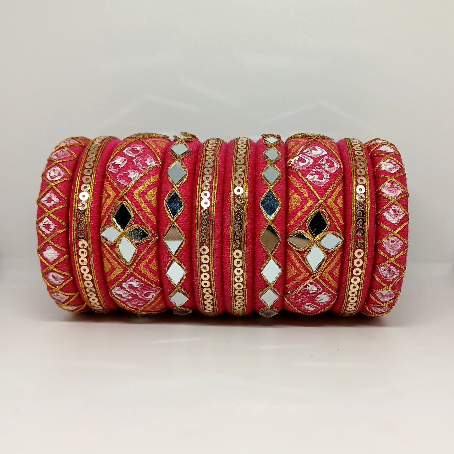 Anokhi [pink and golden colour handcrafted bangles]