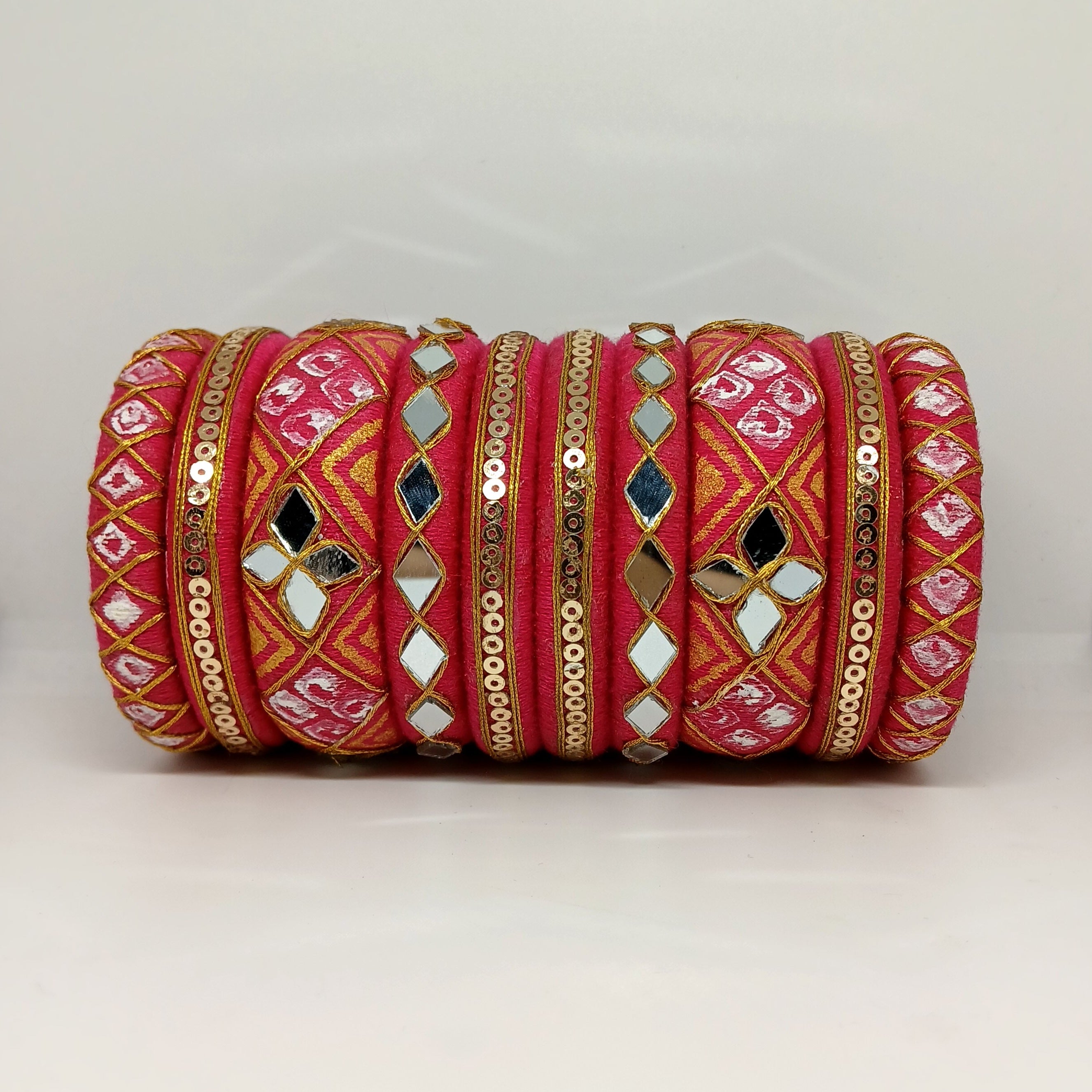 Anokhi [pink and golden colour handcrafted bangles]