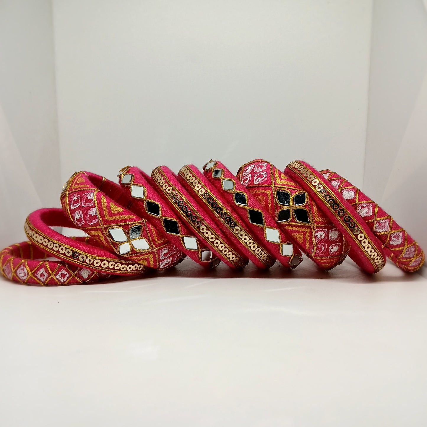 Anokhi [pink and golden colour handcrafted bangles]