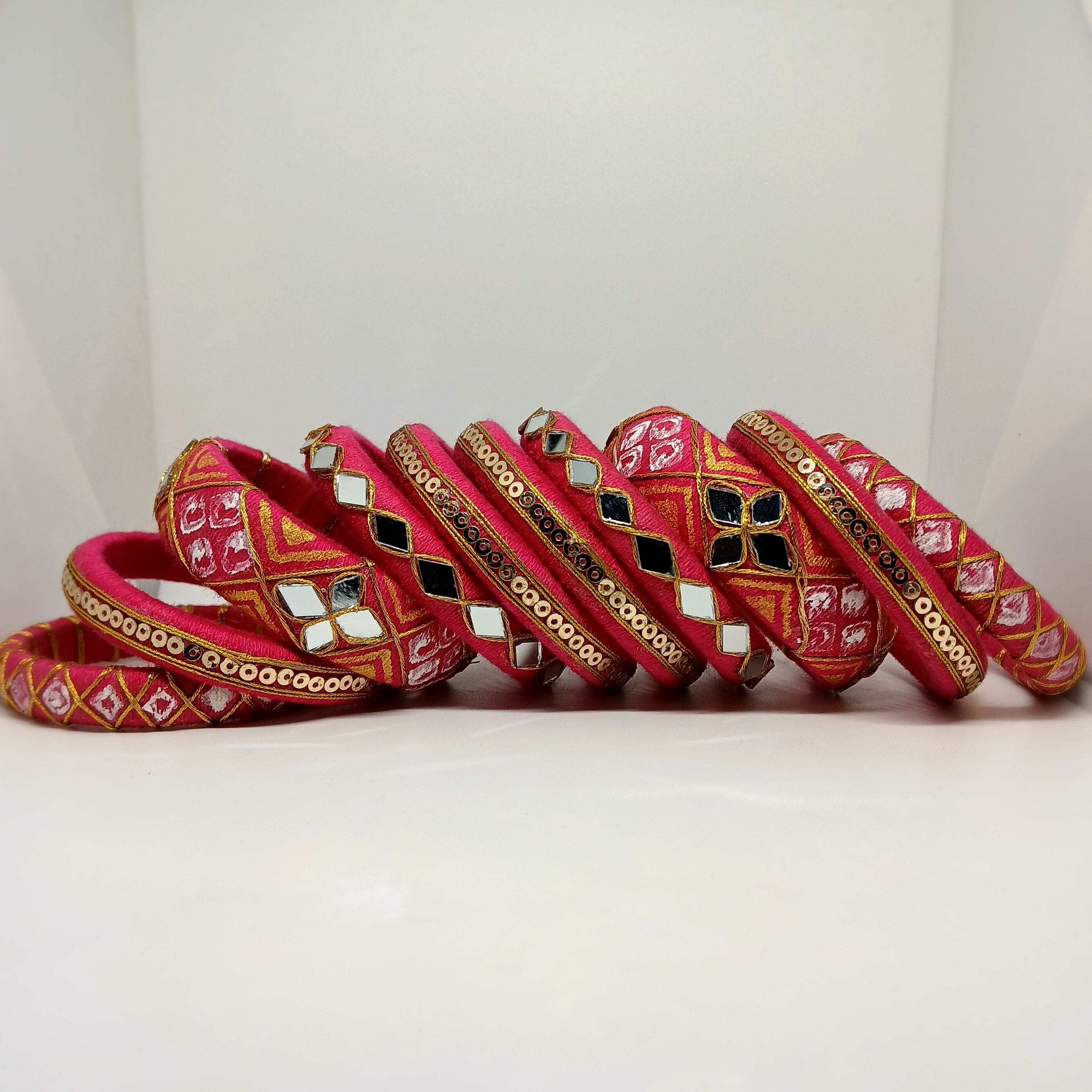 Anokhi [pink and golden colour handcrafted bangles]