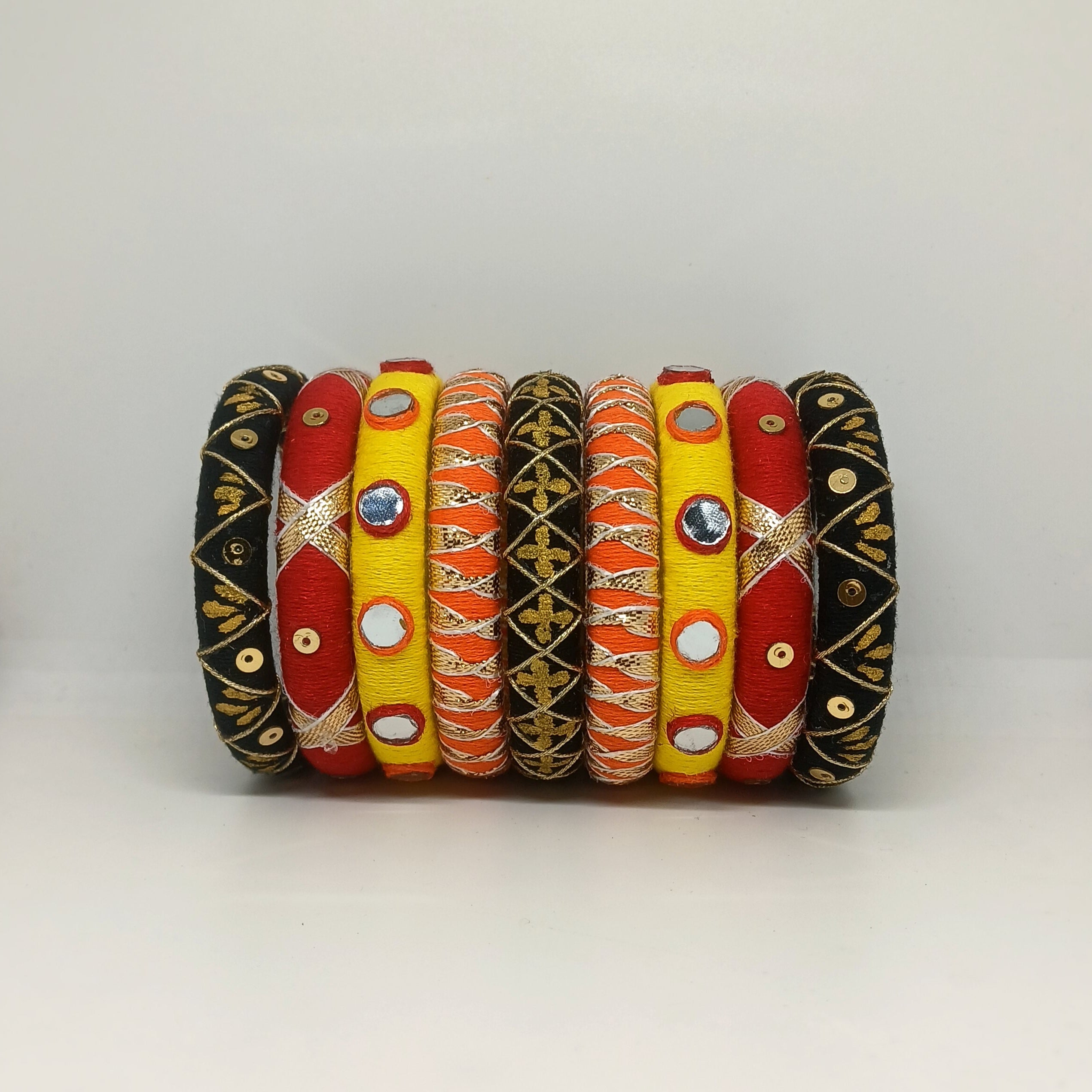 Mandira [Black yellow and red colour handcrafted bangles]